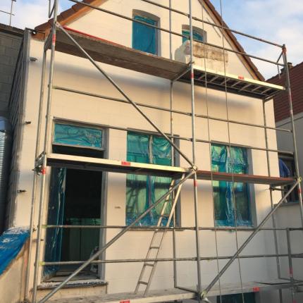 Herstellen van de achtergevel